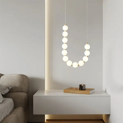 Chandelier Designer ÉclatLuxe Moderne avec Suspension Personnalisable et Éclairage LED pour Intérieurs Contemporains