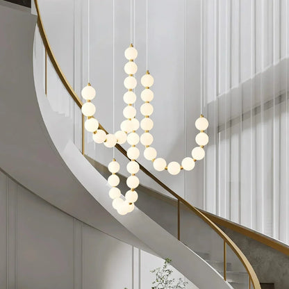 Chandelier Designer ÉclatLuxe Moderne avec Suspension Personnalisable et Éclairage LED pour Intérieurs Contemporains