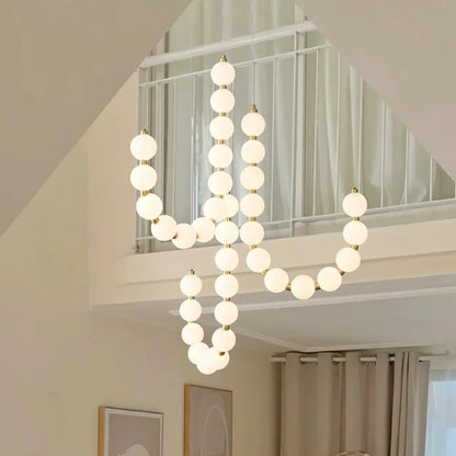 Chandelier Designer ÉclatLuxe Moderne avec Suspension Personnalisable et Éclairage LED pour Intérieurs Contemporains